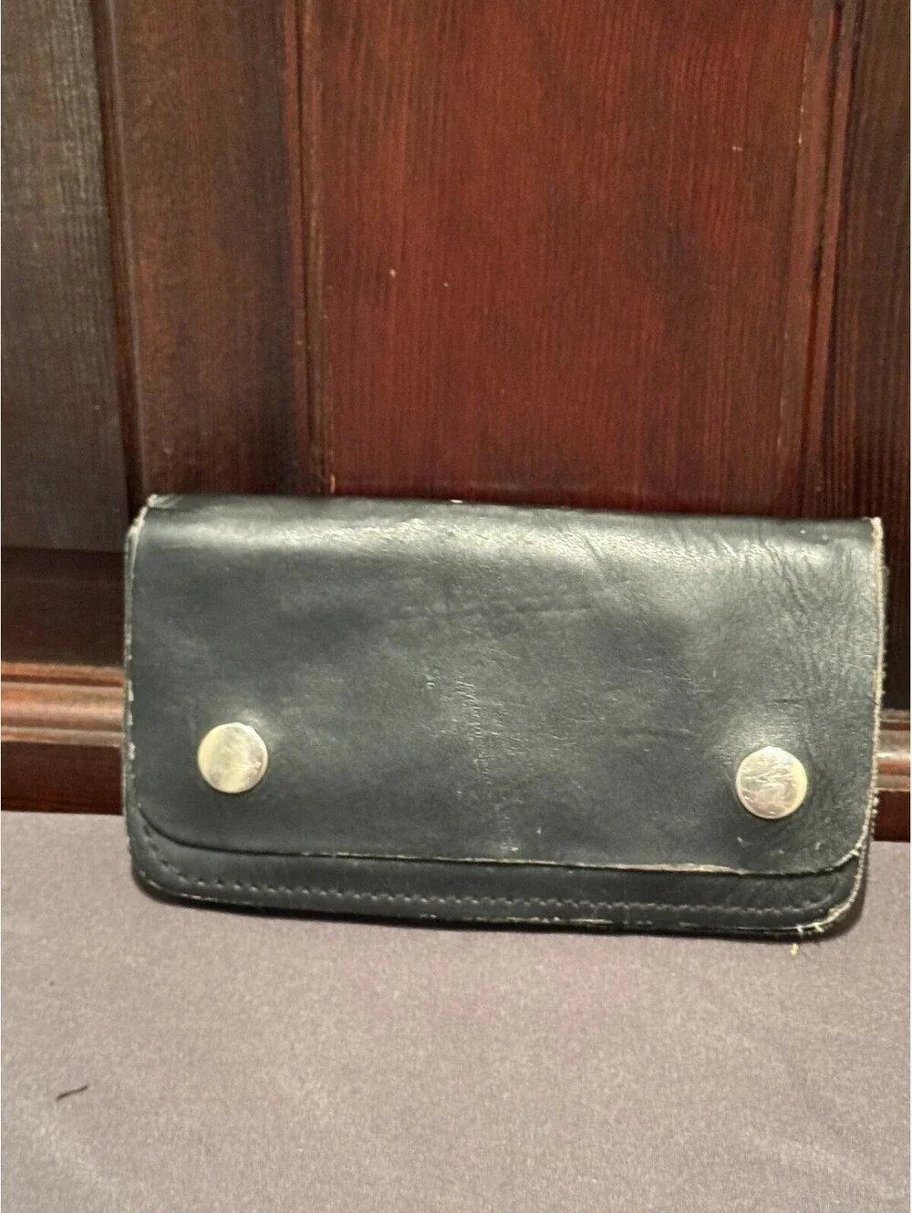 Black Leather Wallet with Snap Buttons and Zippered Compartment